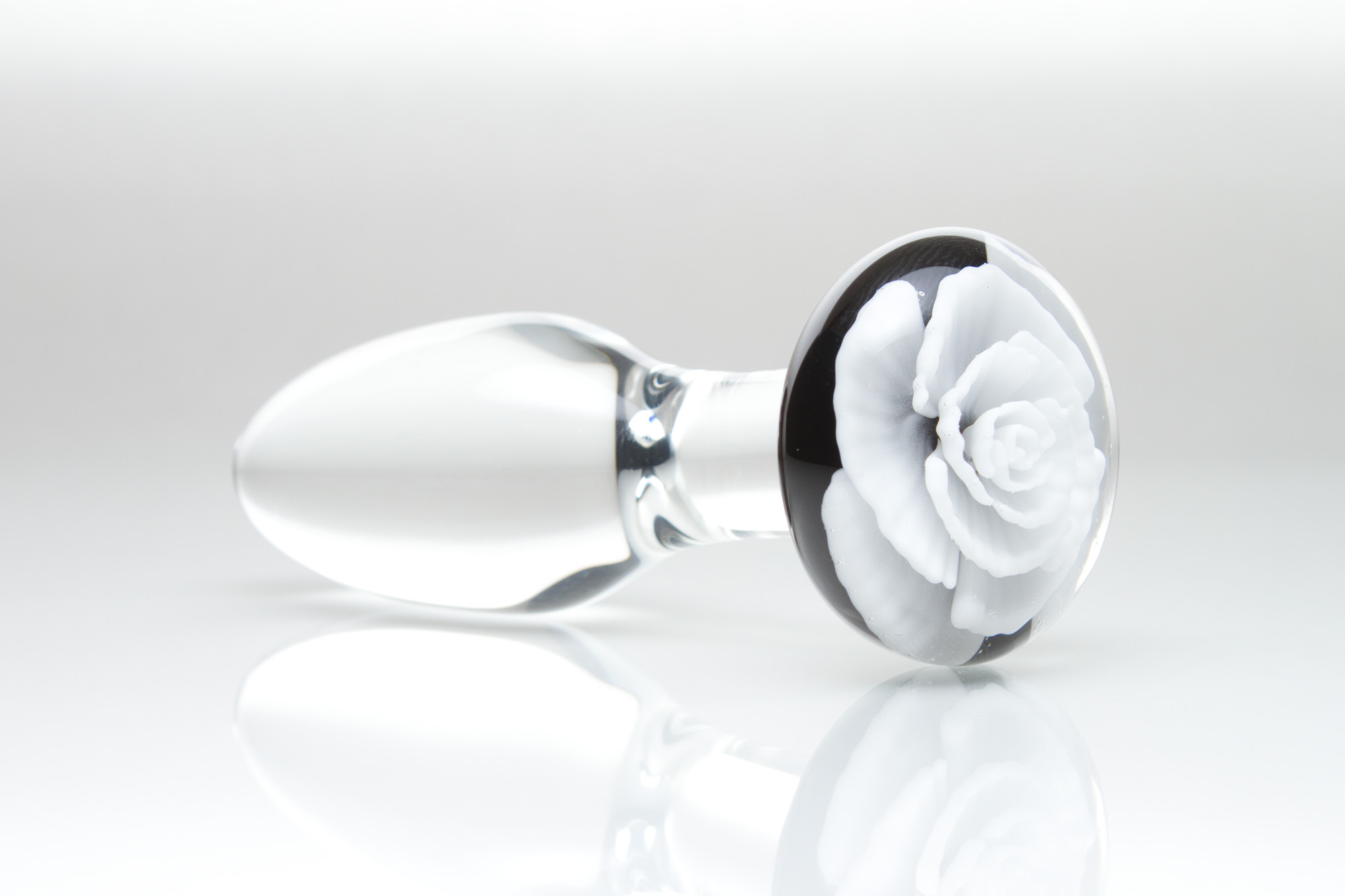 three Quarter View white rose glass butt plug by Hedonic Glass
